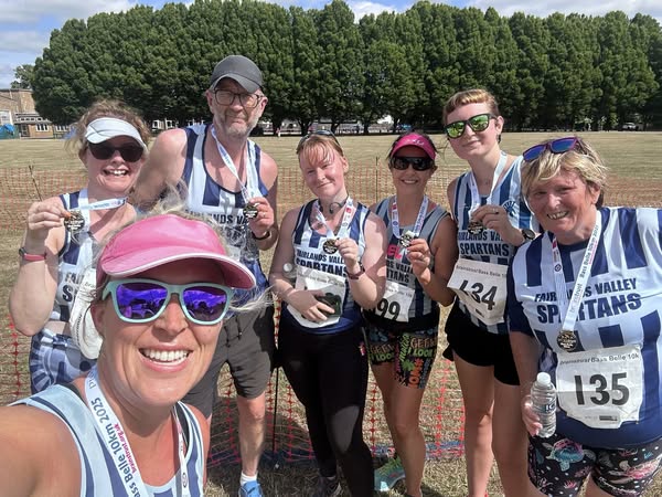 Magnificent Spartan Seven after the Bass Belle 10K on Sunday 22 June 2025