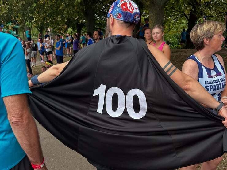 Steve Platt FVS shows off his 100 parkruns cape at Stevenage parkrun (1)